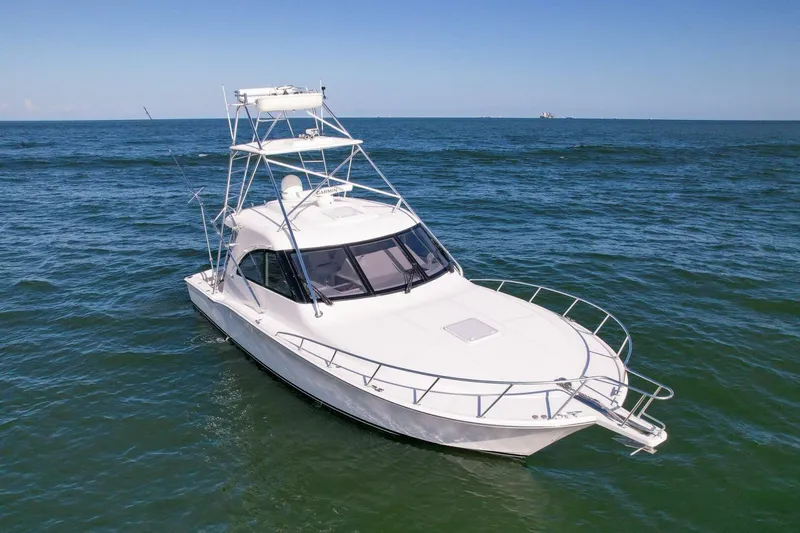 True Story Yacht Photos Pics 2012 Cabo 40 Hardtop Express yacht cruising on open sea.