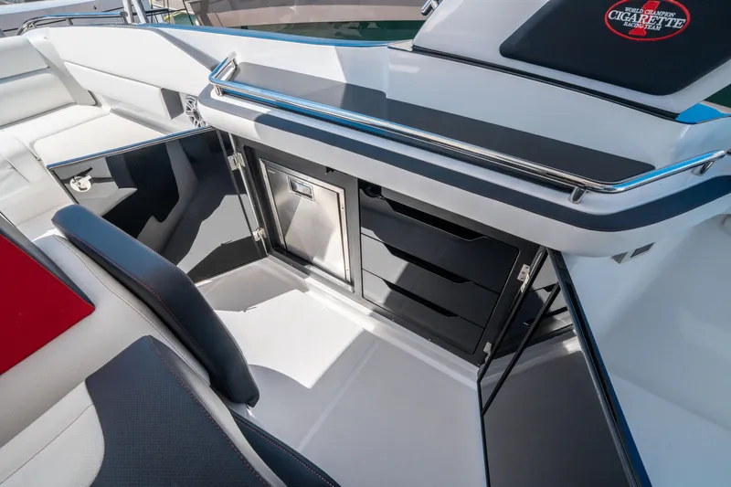  Yacht Photos Pics 2021 Cigarette 59 Tirranna interior with sleek cabinetry and seating.