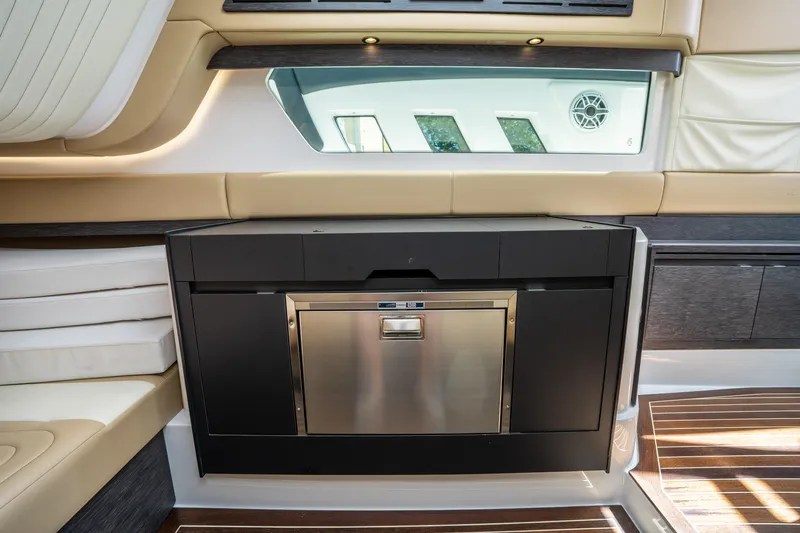  Yacht Photos Pics 2021 Cigarette 59 Tirranna interior with modern cabinetry and seating.