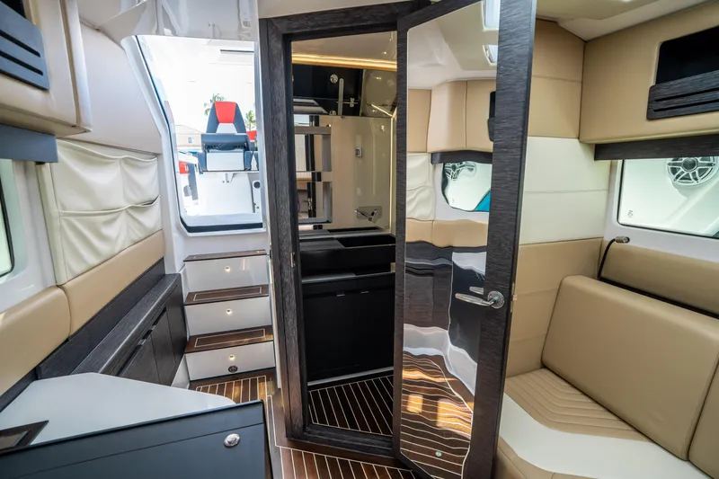  Yacht Photos Pics Luxurious interior of 2021 Cigarette 59 Tirranna yacht with modern furnishings and sleek design.