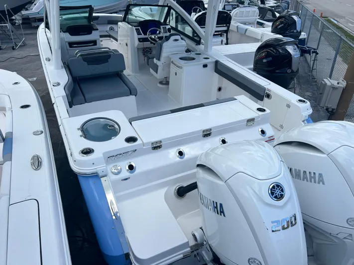  Yacht Photos Pics 2025 Robalo R257 Dual Console boat with Yamaha engines, featuring spacious seating and modern design.