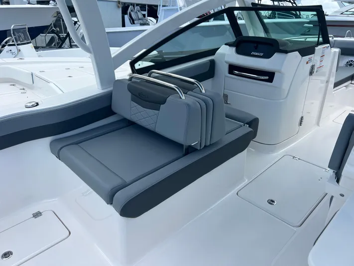  Yacht Photos Pics 2025 Robalo R257 Dual Console boat interior with sleek gray seating and modern design.