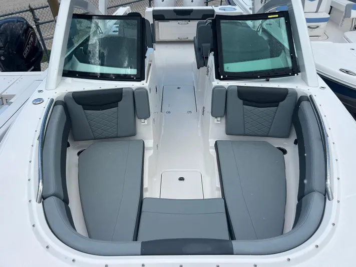  Yacht Photos Pics 2025 Robalo R257 Dual Console boat with spacious seating and modern design.