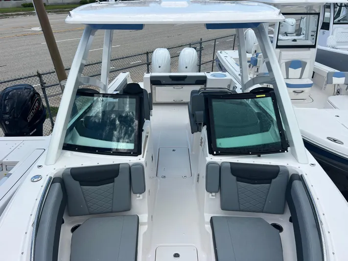  Yacht Photos Pics 2025 Robalo R257 Dual Console boat with spacious seating and modern design.