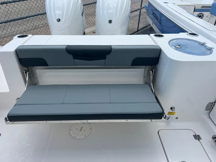  Yacht Photos Pics 2025 Robalo R257 Dual Console boat with foldable seating and sleek design.