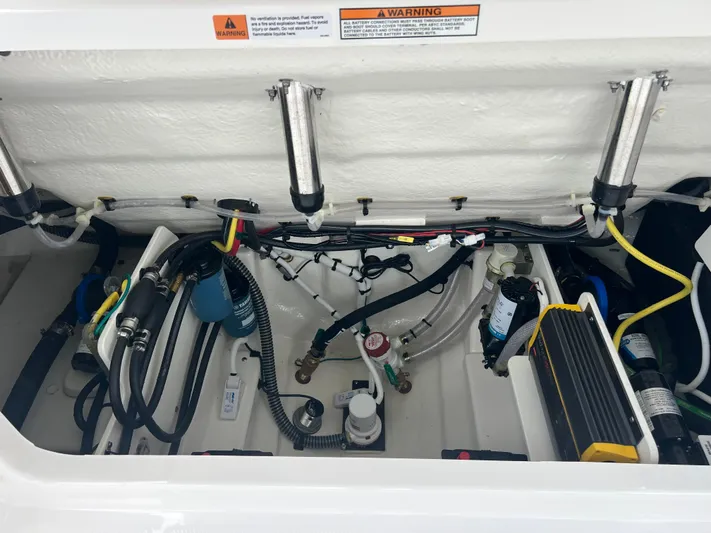  Yacht Photos Pics 2025 Robalo R257 Dual Console engine compartment with wiring and components.