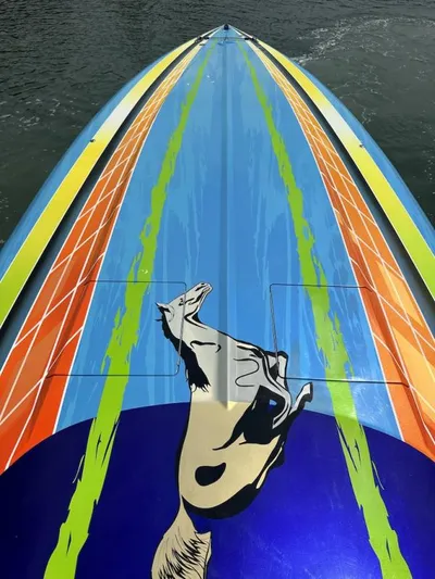  Yacht Photos Pics 2008 Outerlimits 39 Quattro boat with vibrant, colorful graphics featuring a horse design.