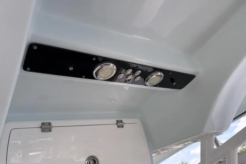  Yacht Photos Pics Control panel of 2017 Sea Fox 288 Commander boat, featuring buttons and dials.