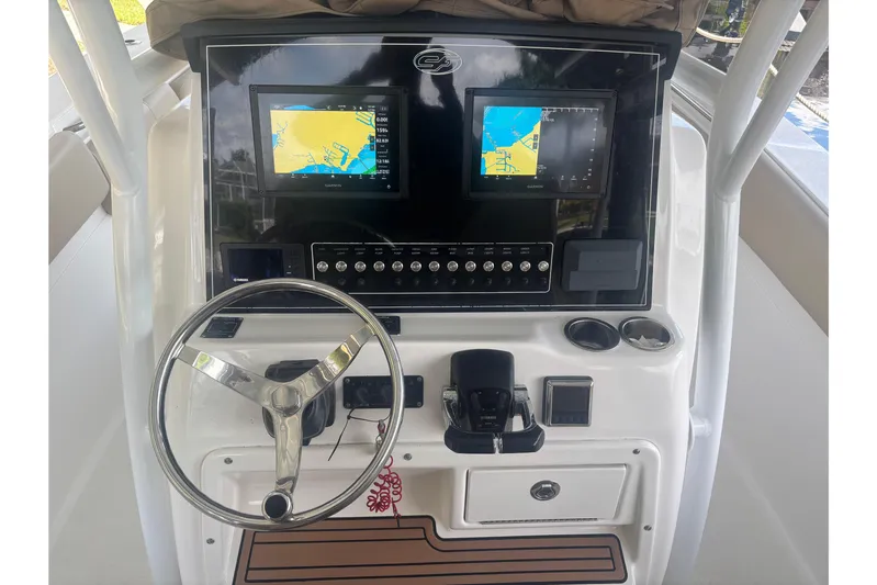  Yacht Photos Pics 2017 Sea Fox 288 Commander dashboard with dual navigation screens and steering wheel.