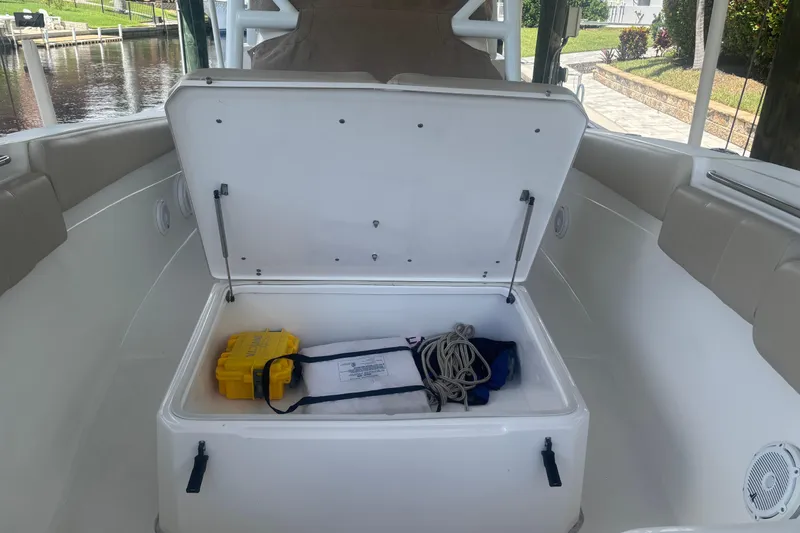  Yacht Photos Pics Open storage compartment on 2017 Sea Fox 288 Commander boat with safety equipment.