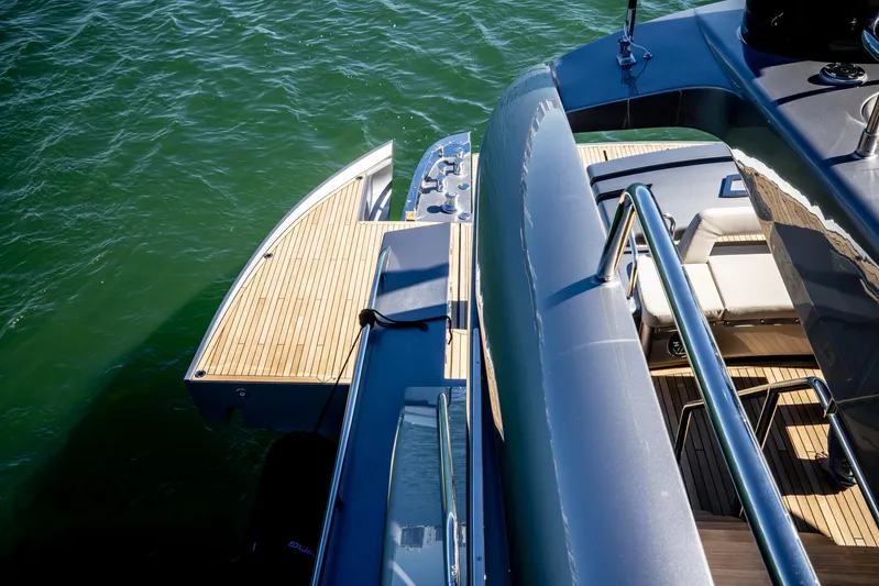  Yacht Photos Pics Luxury Pershing GTX 80 yacht deck, 2025 model, with sleek design and wooden flooring.