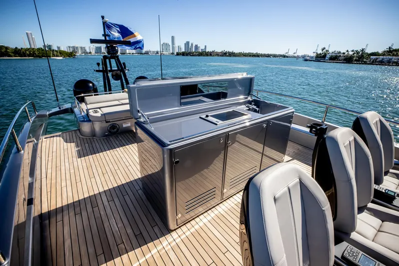  Yacht Photos Pics Luxury deck of 2025 Pershing GTX 80 yacht with sleek outdoor kitchen.