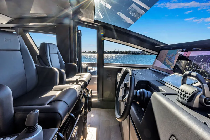  Yacht Photos Pics Luxurious interior of 2025 Pershing GTX 80 yacht with modern navigation system.