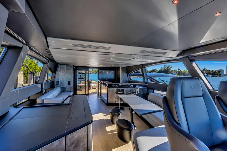  Yacht Photos Pics Luxurious interior of 2025 Pershing GTX 80 yacht with modern seating and panoramic windows.