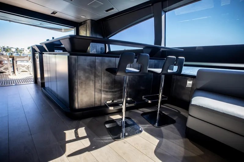  Yacht Photos Pics Luxurious interior of 2025 Pershing GTX 80 yacht with modern bar and seating.