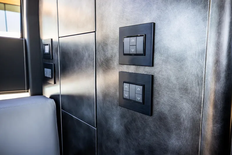  Yacht Photos Pics Interior control panel of 2025 Pershing GTX 80 yacht, featuring sleek modern switches.