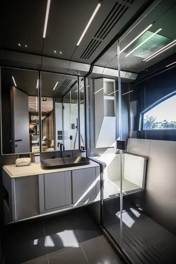  Yacht Photos Pics Luxurious bathroom interior of 2025 Pershing GTX 80 yacht with modern fixtures and sleek design.
