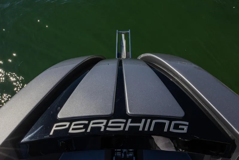  Yacht Photos Pics Top view of 2025 Pershing GTX 80 yacht on green water.