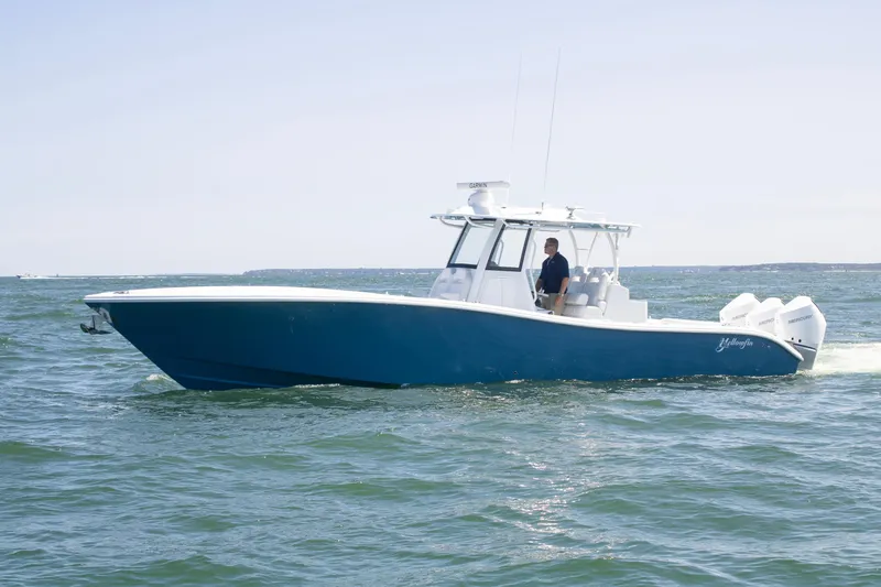  Yacht Photos Pics 2026 Yellowfin 36 Offshore boat cruising on open water.