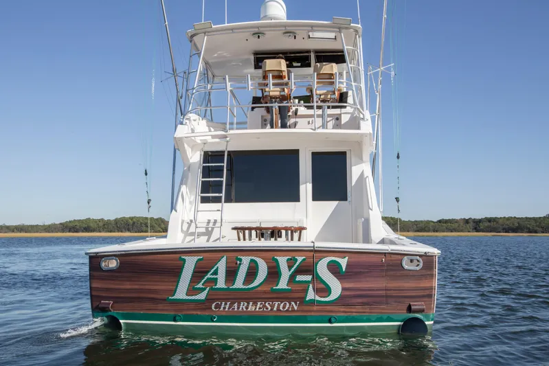 Lady S Yacht Photos Pics 2001 Viking 50 Convertible yacht "Lady-S" on water, rear view.