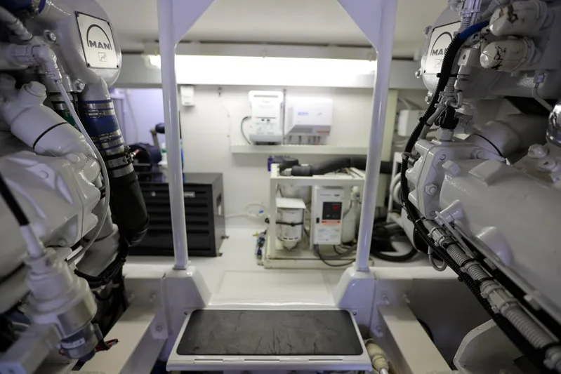 Lady S Yacht Photos Pics Engine room of 2001 Viking 50 Convertible yacht, featuring MAN engines and equipment.