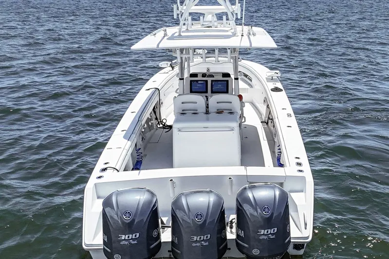  Yacht Photos Pics 2017 Jupiter 34 FS boat with triple Yamaha 300 engines on open water.