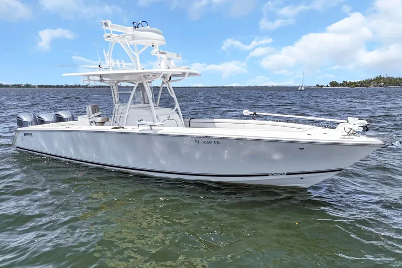  Yacht Photos Pics 2017 Jupiter 34 FS boat on water under blue sky.
