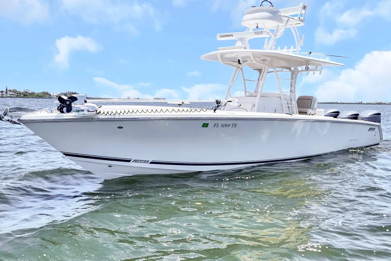  Yacht Photos Pics 2017 Jupiter 34 FS boat on water, clear sky background.