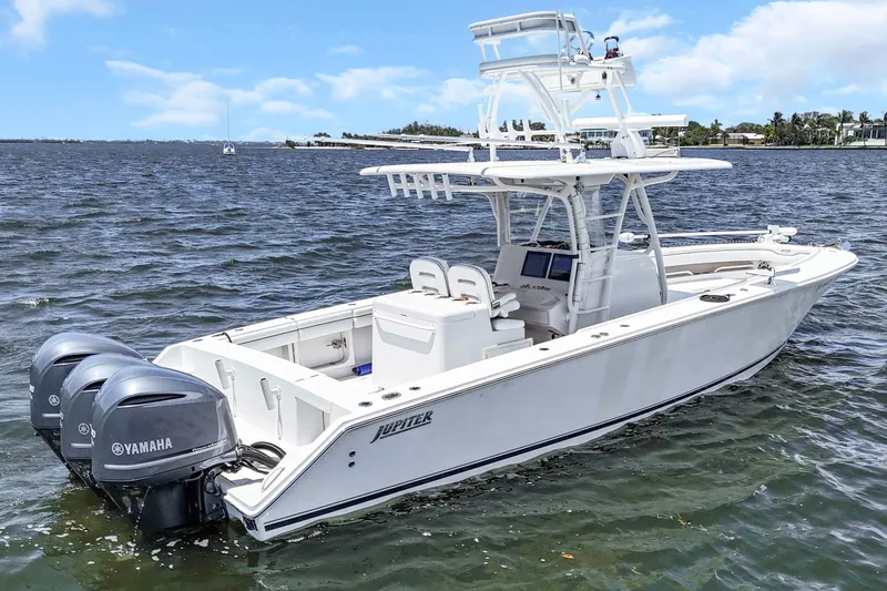  Yacht Photos Pics 2017 Jupiter 34 FS boat with triple Yamaha engines on open water.