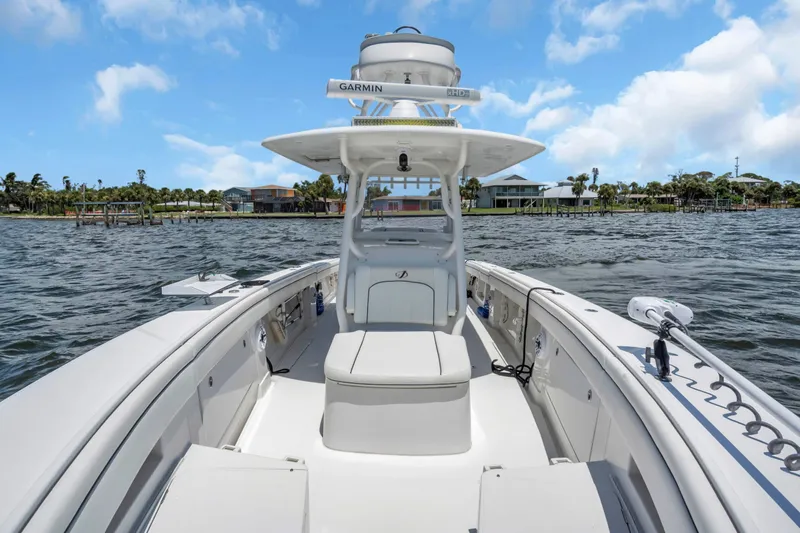  Yacht Photos Pics 2017 Jupiter 34 FS boat on water, featuring Garmin equipment, clear sky background.