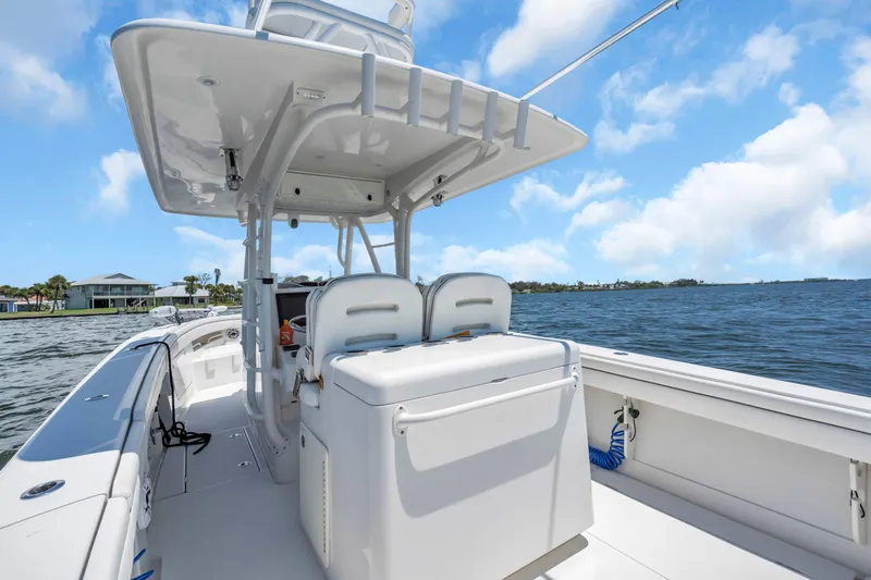  Yacht Photos Pics 2017 Jupiter 34 FS boat on water, clear sky, spacious deck, modern design.