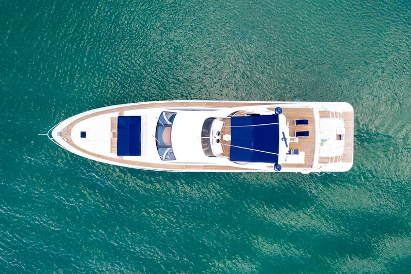  Yacht Photos Pics Aerial view of 2006 Azimut 98 Leonardo yacht on turquoise water.