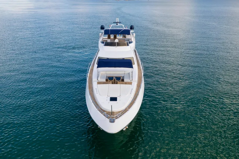  Yacht Photos Pics Azimut 98 Leonardo 2006 yacht on calm blue water, aerial front view.