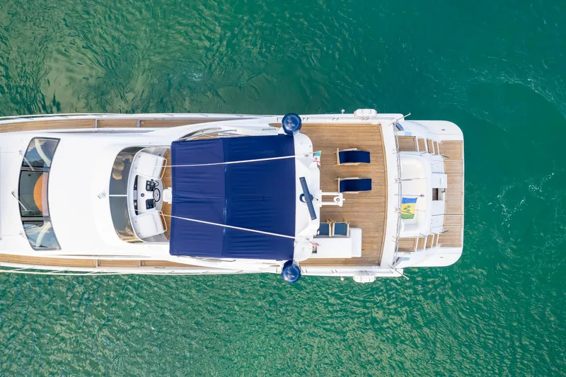  Yacht Photos Pics Overhead view of 2006 Azimut 98 Leonardo yacht on clear water.