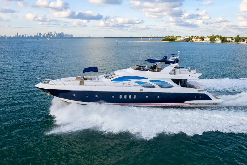  Yacht Photos Pics Luxury Azimut 98 Leonardo yacht cruising on open water, 2006 model.