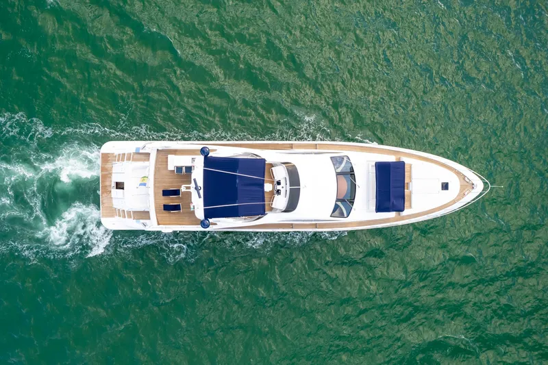  Yacht Photos Pics Aerial view of 2006 Azimut 98 Leonardo yacht cruising on green water.