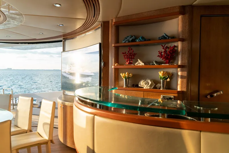  Yacht Photos Pics Luxurious interior of 2006 Azimut 98 Leonardo yacht with elegant bar and ocean view.