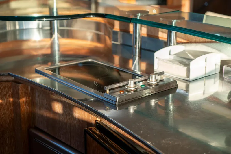  Yacht Photos Pics Luxury yacht kitchen interior with modern stovetop, Azimut 98 Leonardo, 2006 model.