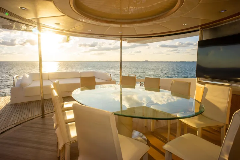  Yacht Photos Pics Luxurious 2006 Azimut 98 Leonardo yacht interior with ocean view at sunset.