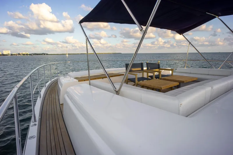  Yacht Photos Pics Luxurious 2006 Azimut 98 Leonardo yacht deck with seating and ocean view.