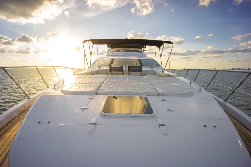  Yacht Photos Pics Azimut 98 Leonardo yacht deck at sunset, 2006 model, on open water.