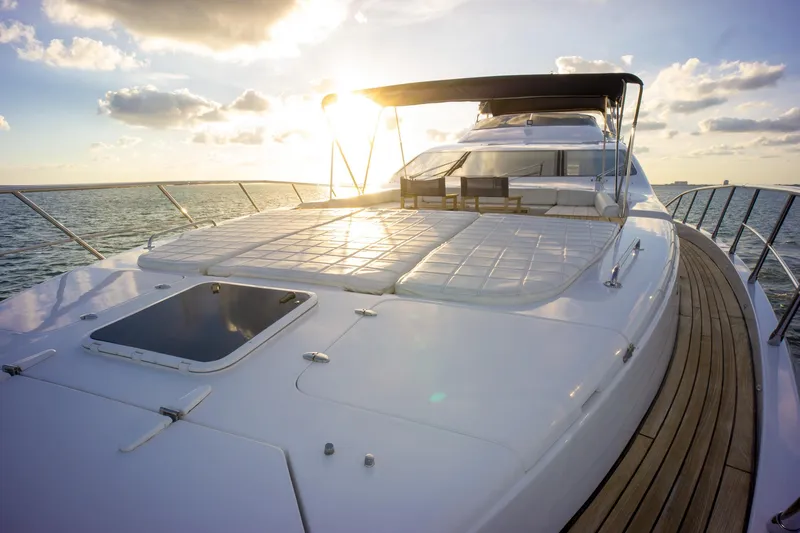  Yacht Photos Pics Luxurious 2006 Azimut 98 Leonardo yacht at sunset on the open sea.