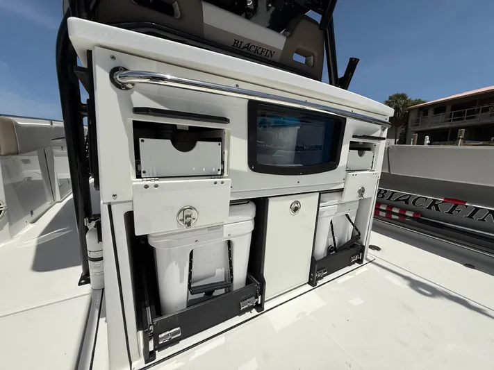 Sammy G Yacht Photos Pics 2020 Blackfin 332 CC boat interior with storage compartments and equipment.