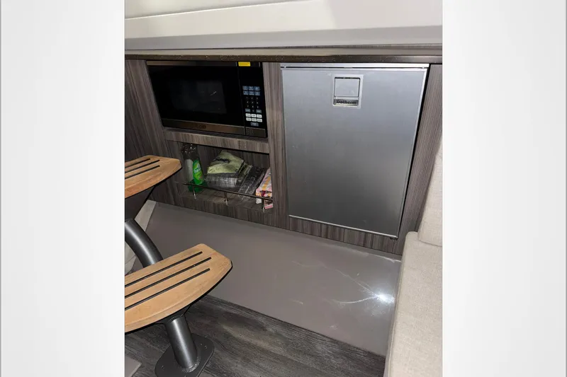  Yacht Photos Pics Interior of 2021 Sea Ray SLX 400 with microwave and compact fridge.
