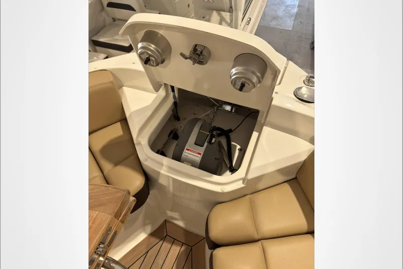  Yacht Photos Pics 2021 Sea Ray SLX 400 boat interior with open storage compartment and seating.