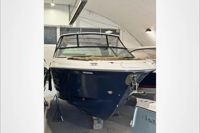  Yacht Photos Pics 2021 Sea Ray SLX 400 boat in indoor storage, front view.
