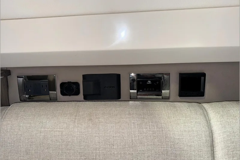  Yacht Photos Pics Control panel and outlets on 2021 Sea Ray SLX 400 boat interior.