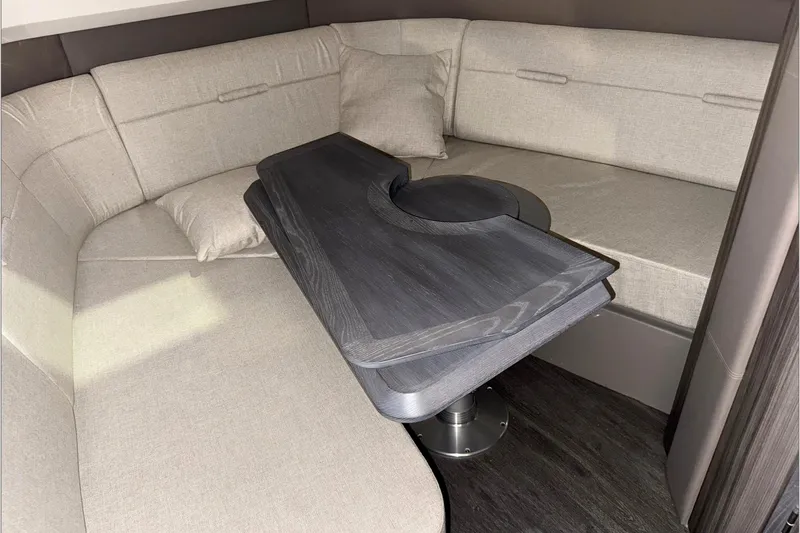  Yacht Photos Pics Luxurious 2021 Sea Ray SLX 400 cabin interior with elegant seating and modern table design.