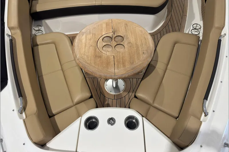  Yacht Photos Pics Luxurious seating area on 2021 Sea Ray SLX 400 boat with wooden table.