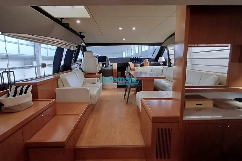  Yacht Photos Pics Luxurious interior of 2008 Ferretti Yachts 592 with elegant seating and wooden finishes.